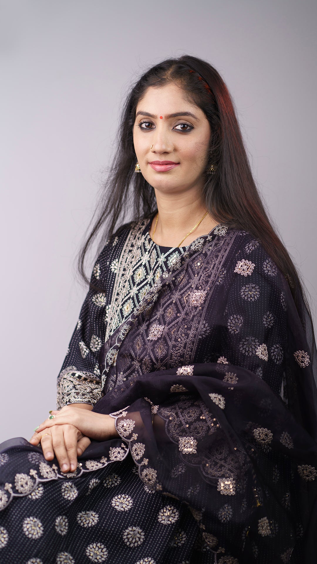 Kurti sets with  large floral designs and full sleeves have patterned ends that match the main design.