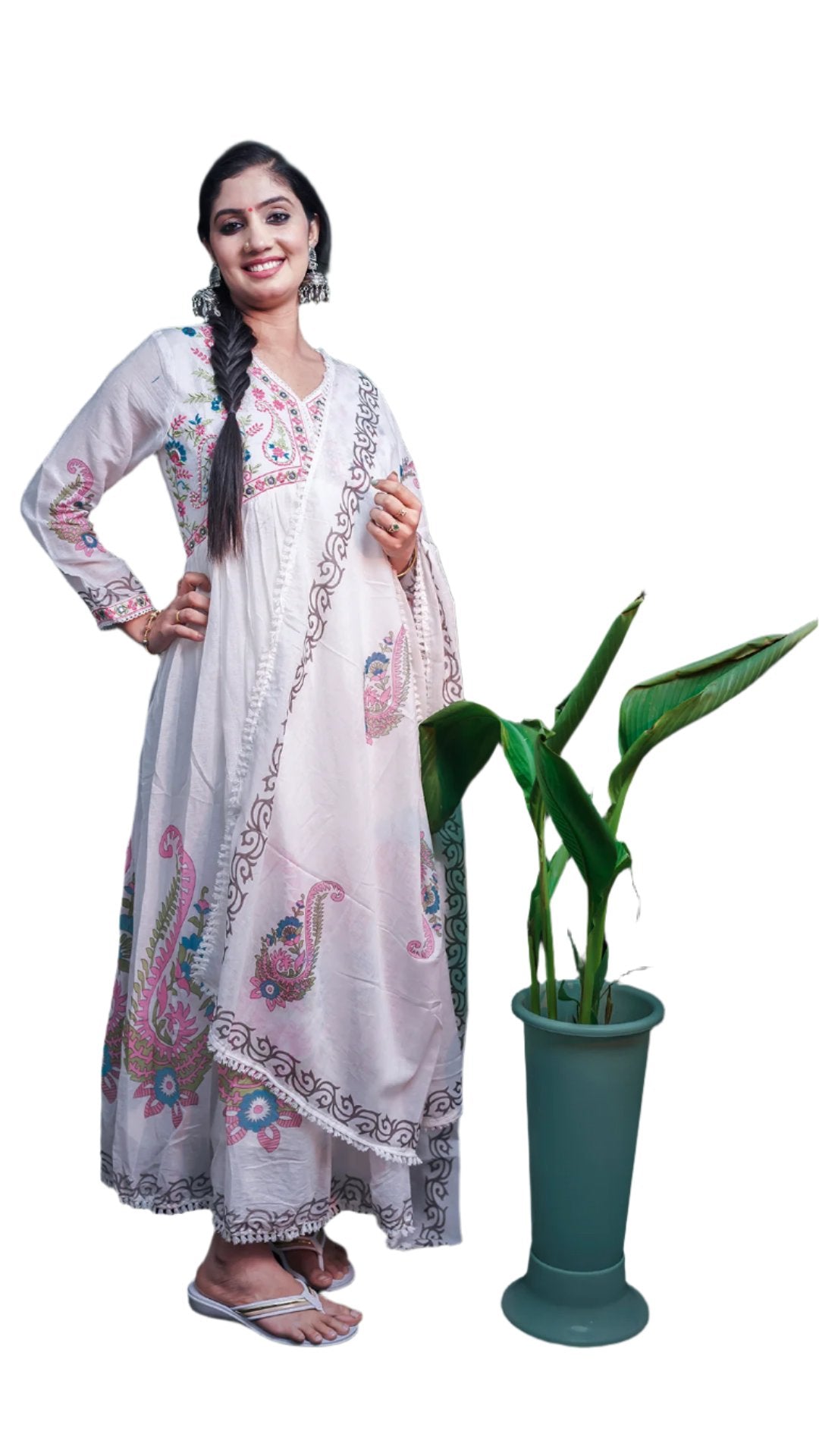 Kurti adorned with traditional embroidery.The embroidery shaped pattern around the neckline.