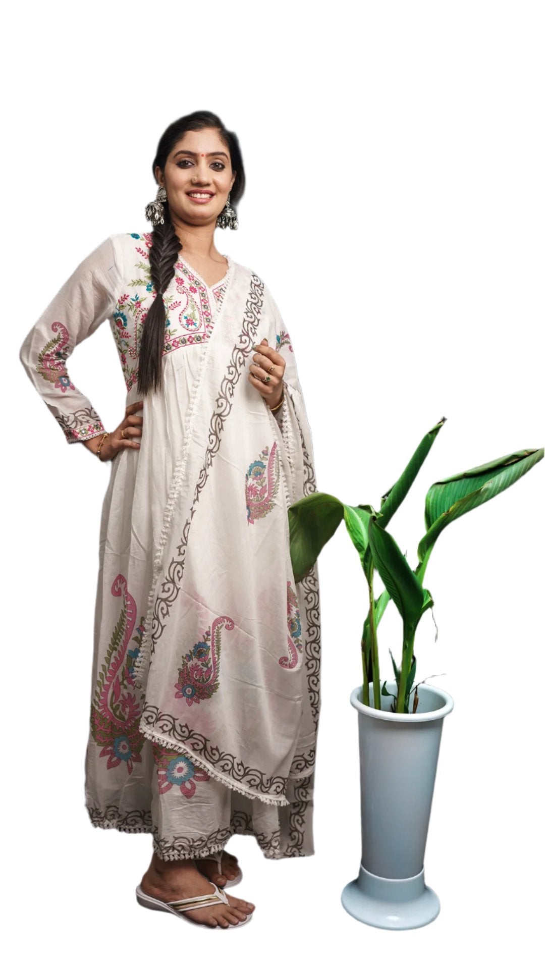 Kurti adorned with traditional embroidery.The embroidery shaped pattern around the neckline.