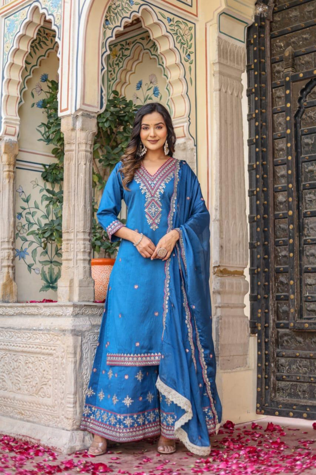 Women's trendy party wear salwar set.