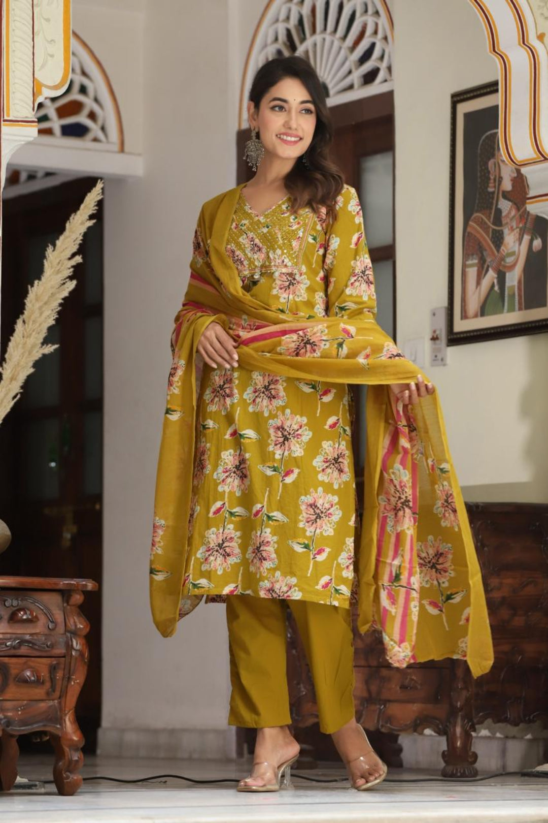 Women's wear cotton salwar set with V - neck pattern.