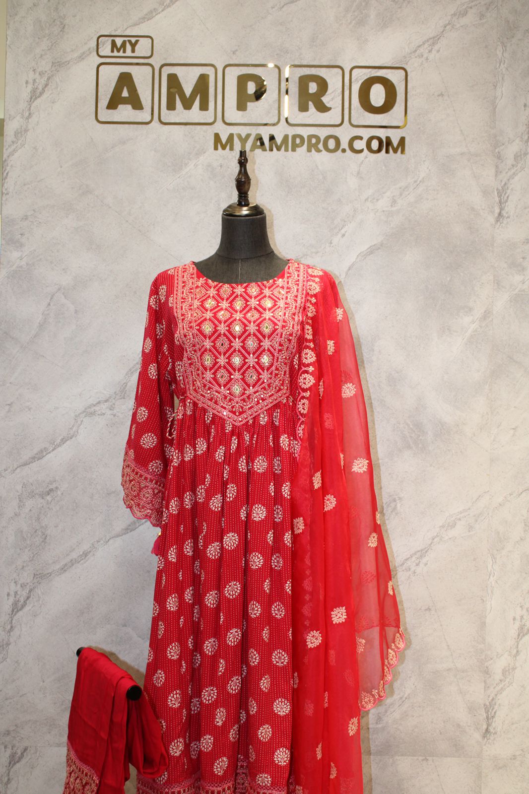 Kurti sets with  large floral designs and full sleeves have patterned ends that match the main design.