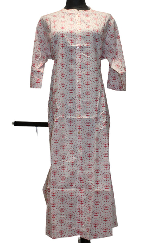 Kurta set in knee-length is adorned with a small floral pattern .It boasts short sleeves, a round neckline, and a tailored, fitted silhouette.