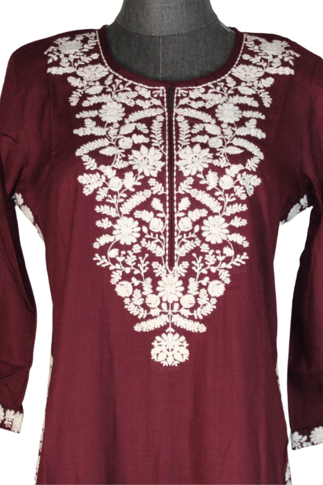 Chikankari single kurti for   women which has handmade embroidery along the neckline, chest area, and sleeve edges.