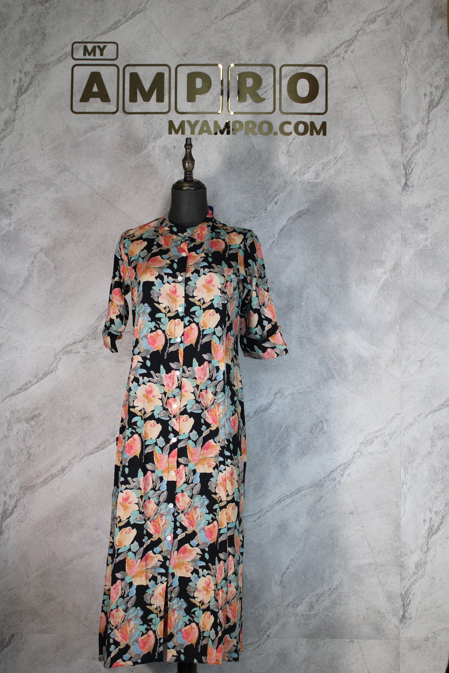 The kurti in the image features a lovely floral print.