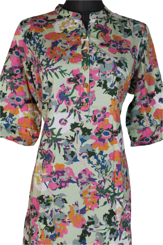 The cotton kurti in the image features a lovely floral print.