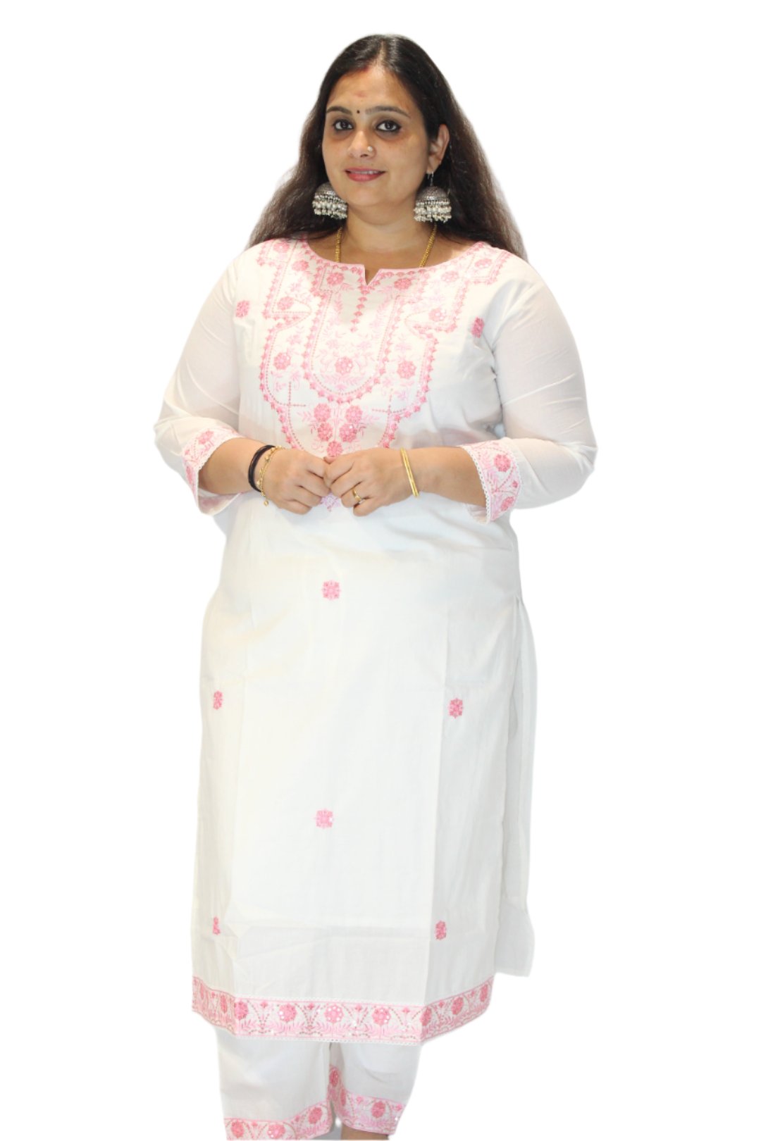 The dress is a white traditional garment adorned with intricate pink embroidery. It features detailed patterns around the neckline and throughout the fabric, showcasing skilled textile work.