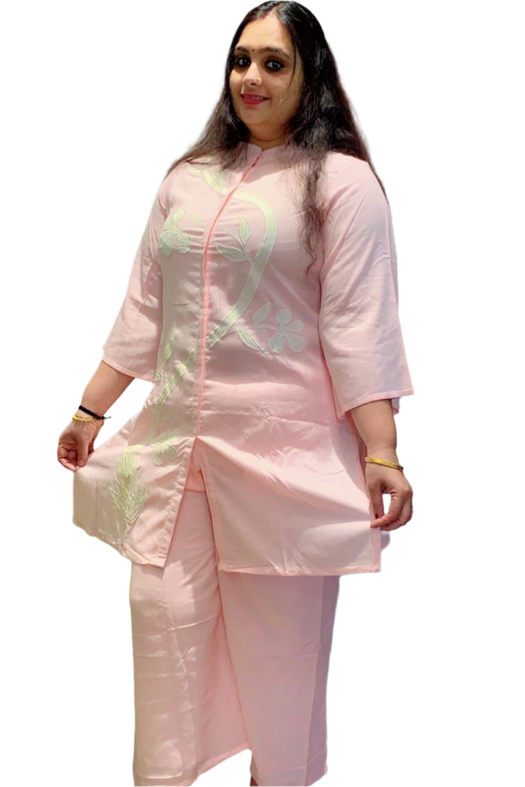 Co-ord set kurta with full sleeves and a straight cut design, showcasing intricate floral and leaf patterns predominantly along the left side.