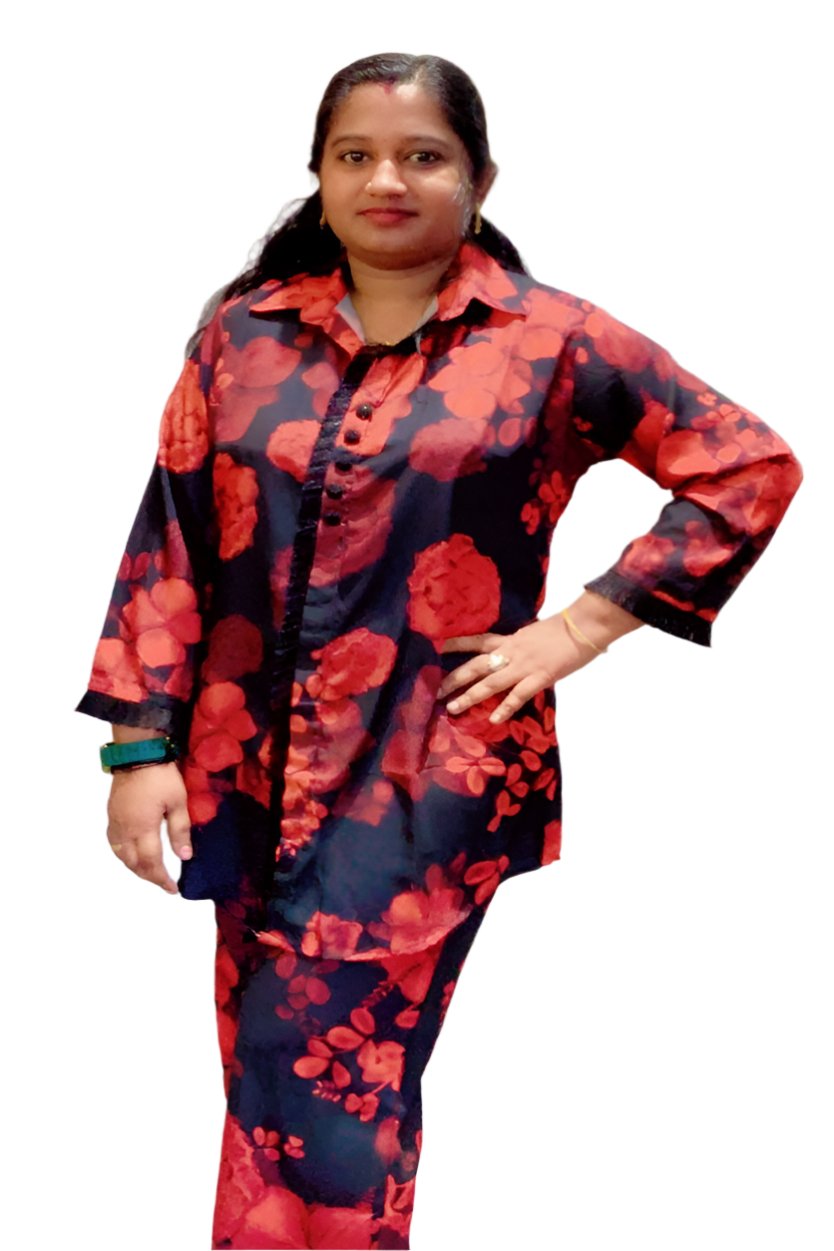 Co Ord Set  Outfit Adorned With A Floral Pattern. The Ensemble Consists Of  Long Sleeved Shirt And Matching Pants.