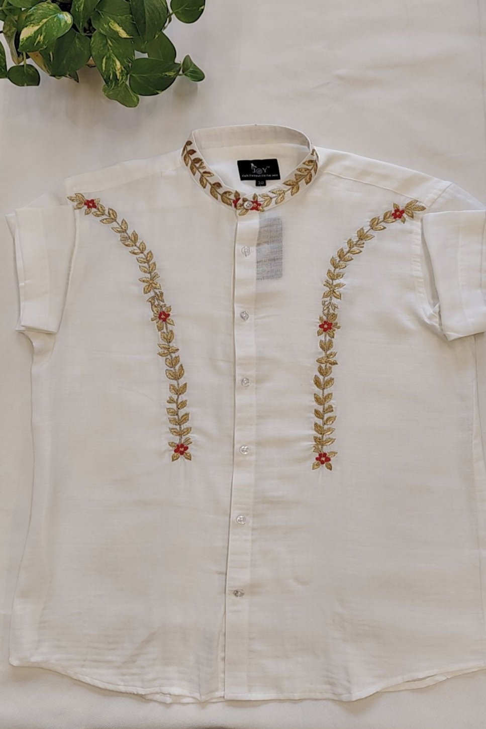 Men's wear cotton half sleeve shirt with embroidery pattern.